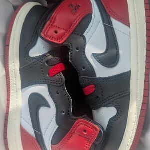 Kids Jordan Red and Black Sneakers